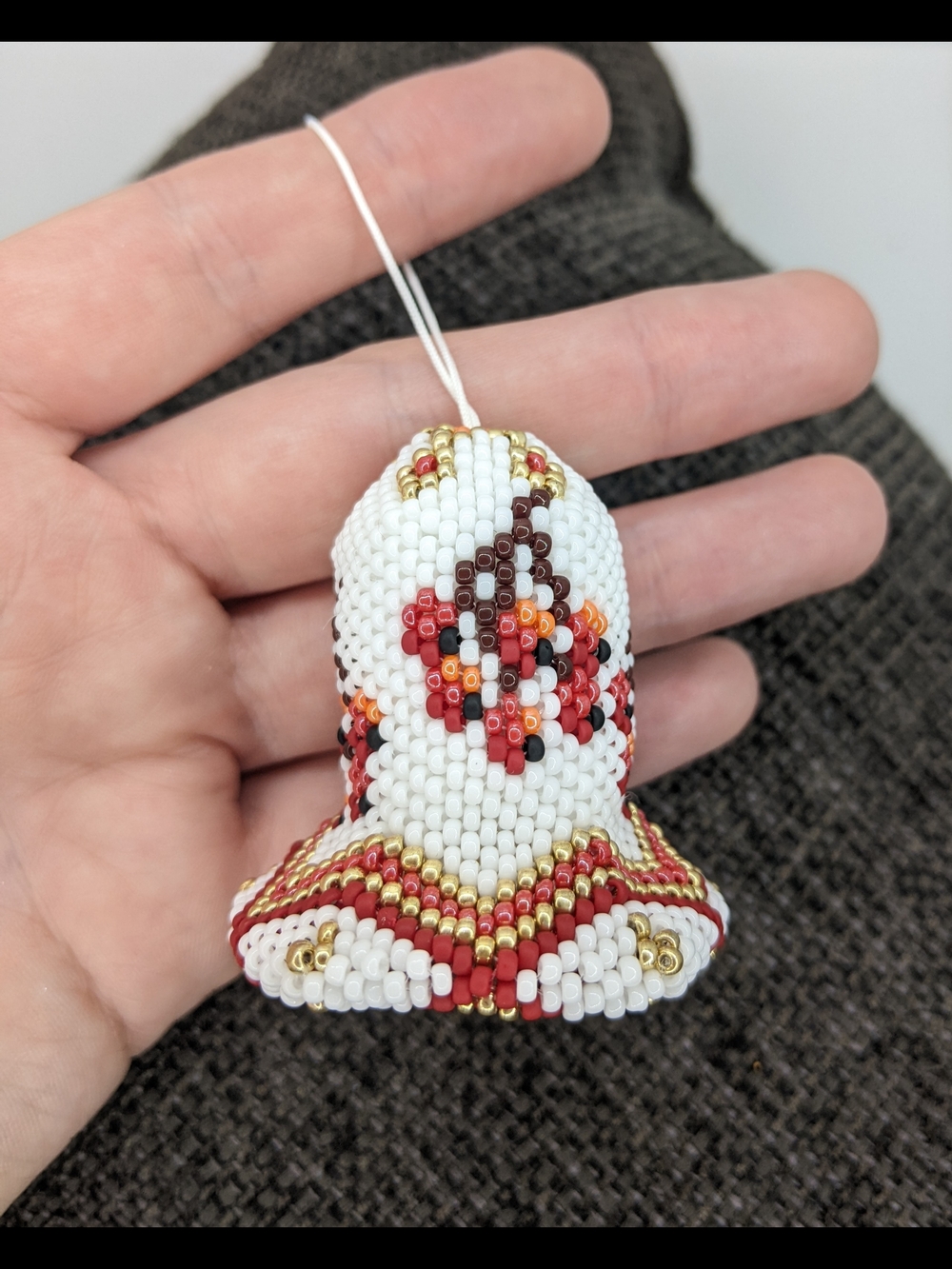 Handmade White Beaded Bell Ornament with Red and Gold Accents